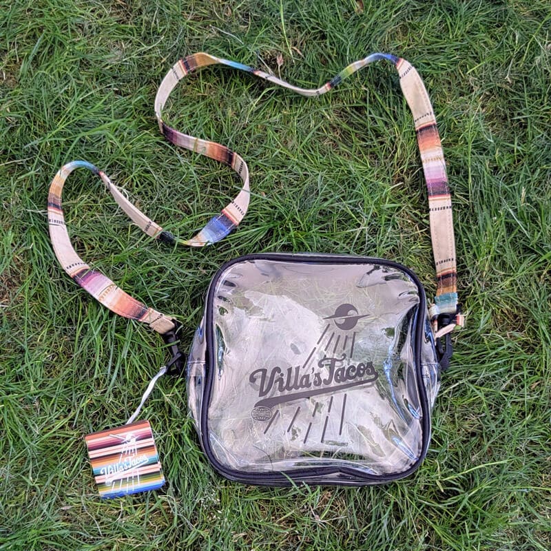 Villas Tacos Essential Bag clear crossbody with adjustable strap, designed for daily essentials in LA-inspired streetwear style